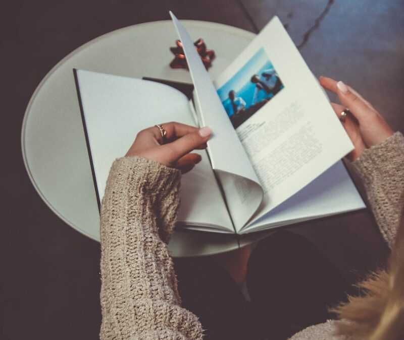 iPad, woman reading a book, Happy New Year 2025